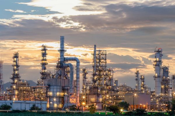 Oil refinery plant from industry zone, Aerial view oil and gas industrial, Refinery factory oil storage tank and pipeline steel at night.; Shutterstock ID 1683847615; Purchase Order: CT